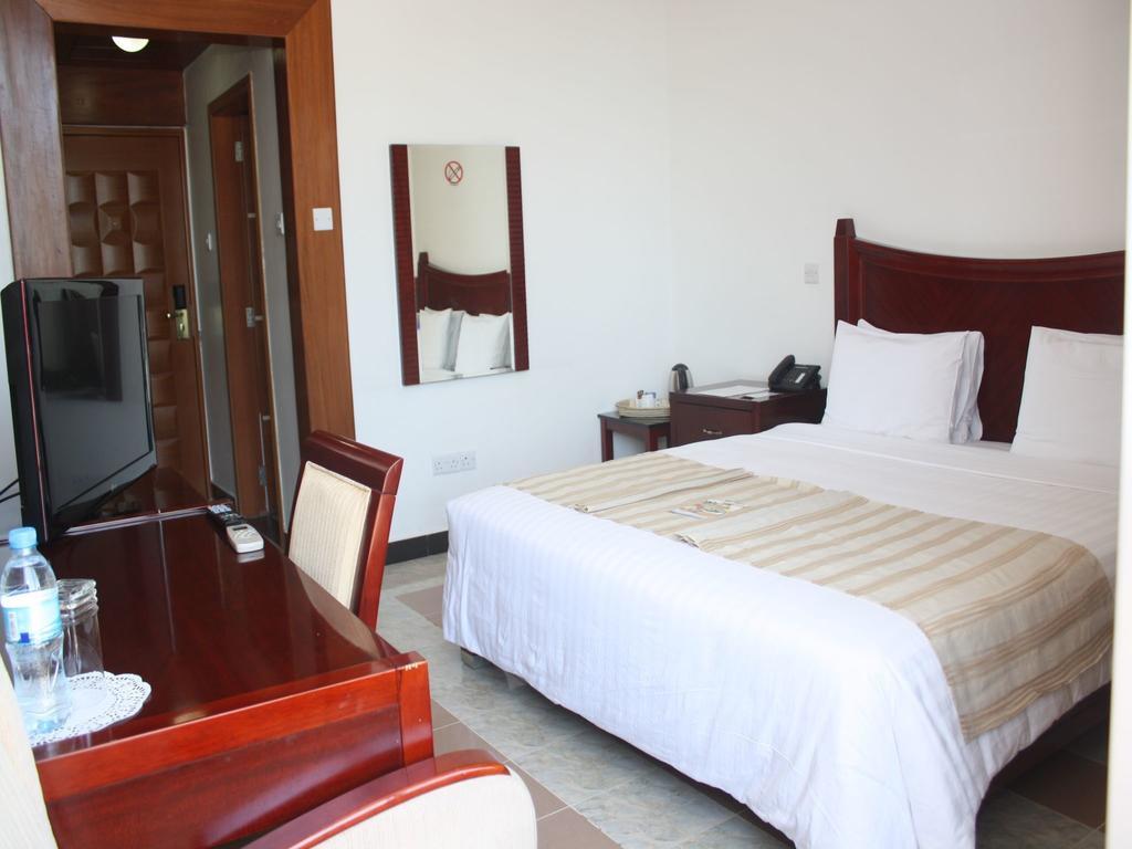 Peacock Hotel Dar es Salaam Ruang foto